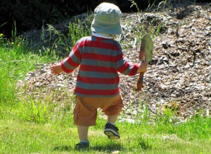 baby and shovel | Mom Blogger